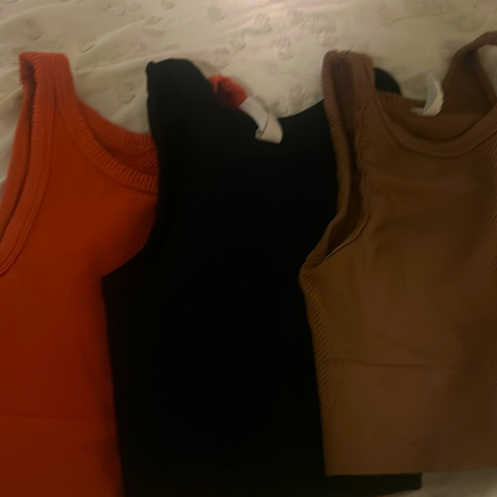 3 NIKIBIKI cropped tank top bundle OS brown, orange, and black.